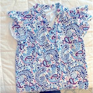 Multi colored blouse purchased from a boutique.